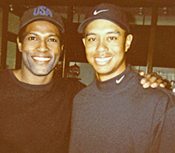 Michael and Tiger Woods Working With Tiger Woods